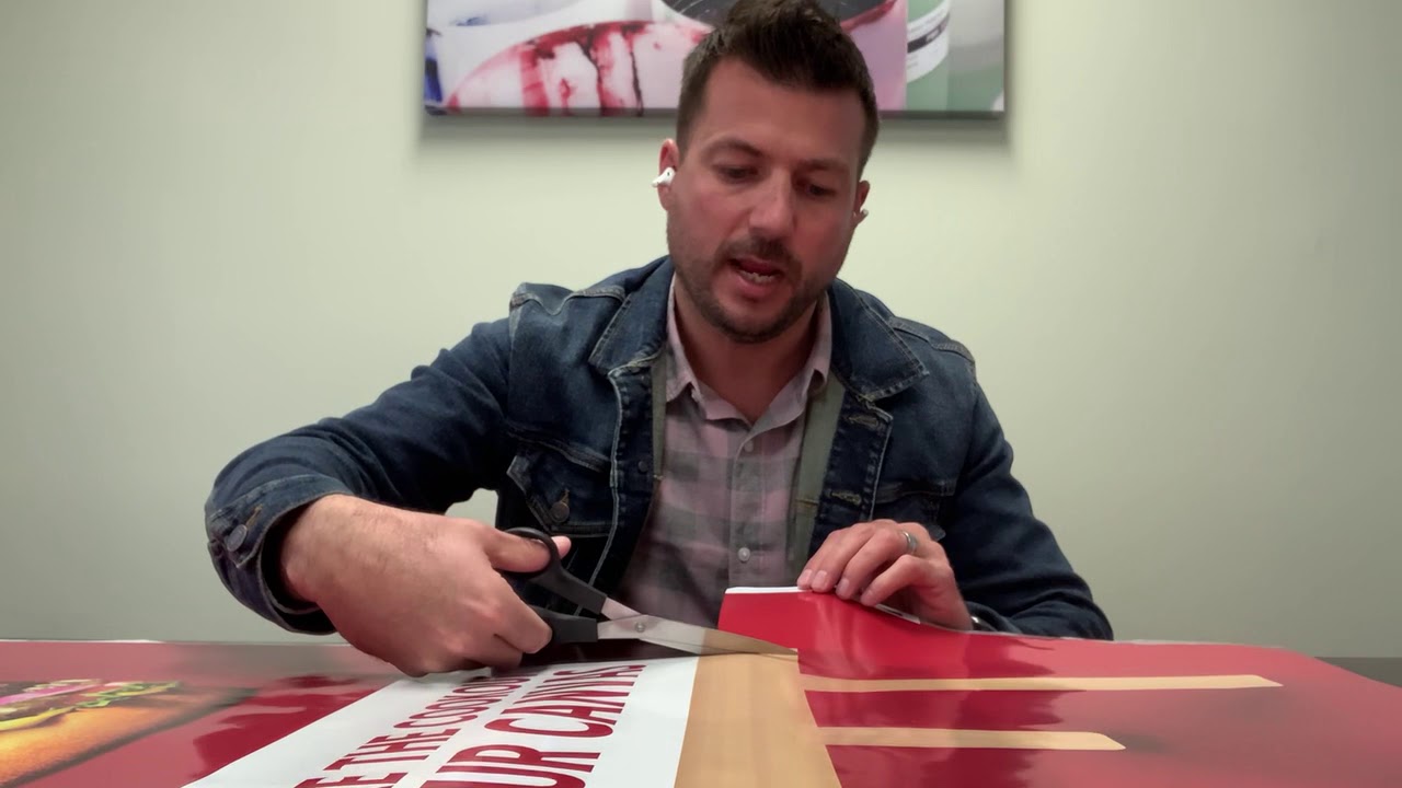 Huston Patterson's Joe Morelli demonstrates how to determine grain direction on a litho label